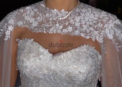 Wedding Dress Used Once-Like New/فستان زفاف أستعمل مرة كالجديد