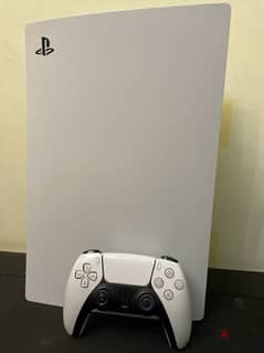 PlayStation 5 with one controller with a box