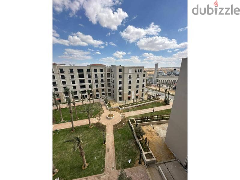 Apartment Fully finished Village West Sheikh Zayed 3