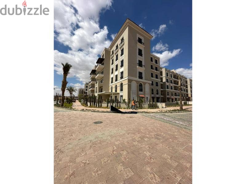 Apartment Fully finished Village West Sheikh Zayed 9