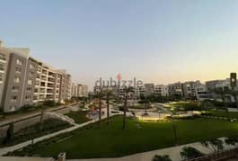 apartment with garden in cairo festifal city compound ready to move fully finished