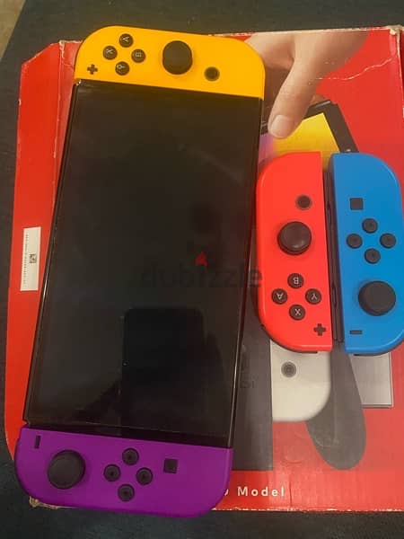 Nintendo switch Oled للبيع with dock 1