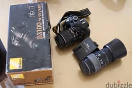 Nikon d3100 with a kit lens + sigma 70-300 + with a bag