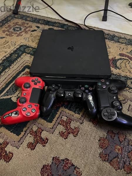 PS4 Slim + 3 Original Controllers all from KSA 0