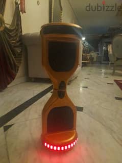 used hover board in perfect condition, comes with a charger & remote