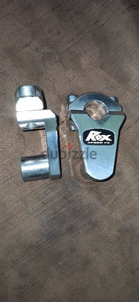 Rox motorcycle HANDLEBAR RISER for lowe back pain relief.