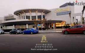 The English translation of ""Premium Office for Rent with Panoramic View in Madinaty East Hub. "