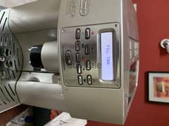 ماكينة قهوة اسبرسو ديلونجي تحتاج للصيانة