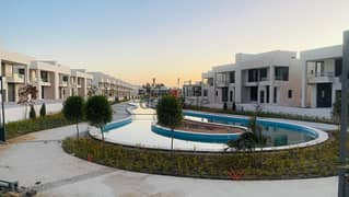 Live immediately in installments in a resale villa in a lively and residential compound in Sheikh Zayed, in front of Beverly Hills
