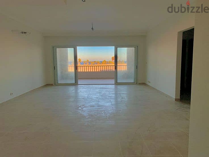 VIP apartment with 5% down payment, very special view in front of the airport in Taj City, in installments 7