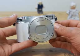 Nikon Digital Camera 1 J5 (متاح بدل بموبايل Samsung)