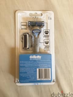 مكنة حلاقة Gillette سكين جارد و معاها ٨ امواس حلاقة سكين جارد زيها