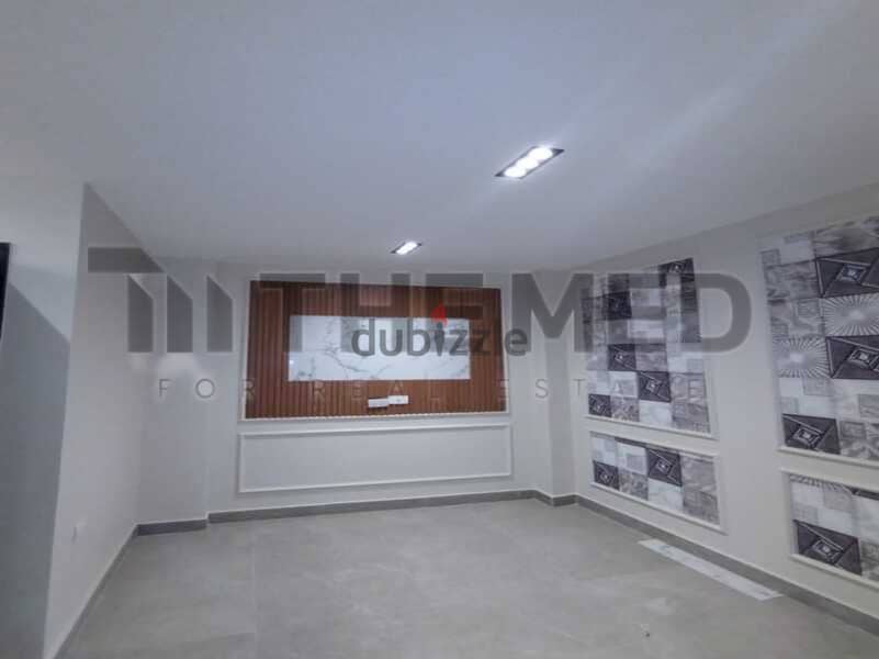 Apartment for sale with open view, ready to move, in the Ninth District, Sheikh Zayed 7
