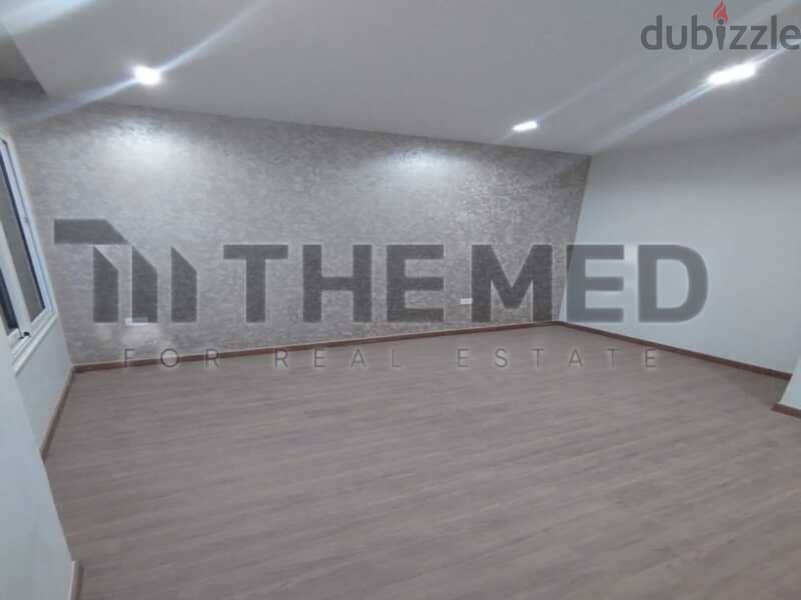 Apartment for sale with open view, ready to move, in the Ninth District, Sheikh Zayed 9