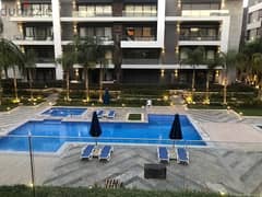 For sale, 160 sqm apartment + 40 sqm garden (finished for immediate delivery) in the heart of the Fifth Settlement, El Patio 7 Compound, Lavista New C