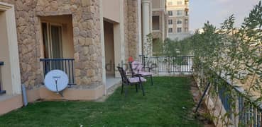 Ground floor apartment for rent with a private garden in 90 Avenue Compound, fully furnished