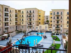 شقة استلام فوري متشطبة ومطلة على حمام السباحة للبيع في بوليفارد ميفيدا