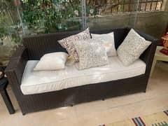 2 sofas rattan and table 0