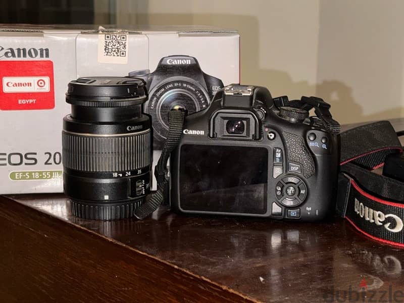 canon 2000D like new. stil in warranty+kit lens+32GB Card 1