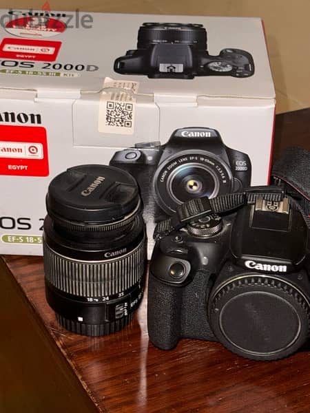 canon 2000D like new. stil in warranty+kit lens+32GB Card 2