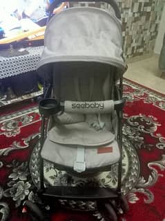 عربيه اطفال ماركه seebaby وكرسيت سياره استعمال خفيف