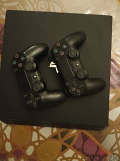 Playstation 4 pro with two controllers
