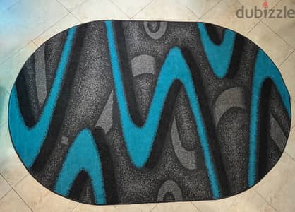 Carpet with abstract shapes | سجادة بأشكال مختلفة