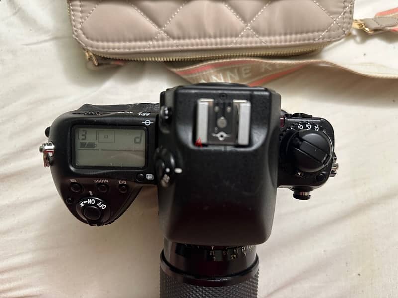 Nikon  zoom Nikkor  نيكون f5 0