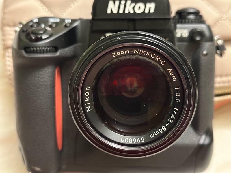 Nikon  zoom Nikkor  نيكون f5 4