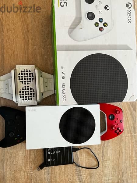 Xbox- S withbx  and the charger and holer 5