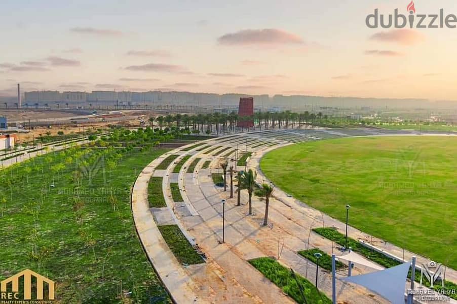 A ground store without a deposit and a 10% discount in the tourist towers in front of the monorail station in the heart of the Green River, Bin Zayed 7