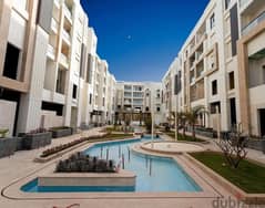 Immediately receive a finished apartment with kitchen, managed by Concord International, in front of City Center Almaza, with a 10% down payment and t