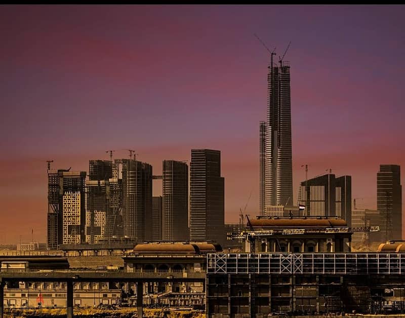 Without down payment, a fully finished office in the first skyscraper area in Egypt, in front of the iconic tower, the Green River, and Bin Zayed Axis 10
