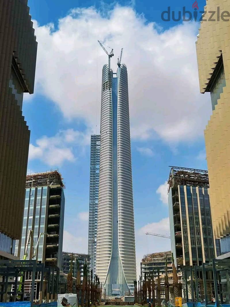 Without down payment, a fully finished office in the first skyscraper area in Egypt, in front of the iconic tower, the Green River, and Bin Zayed Axis 12