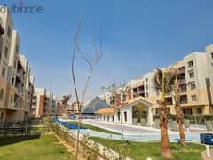 For sale, a penthouse in Promenade Wadi Degla Compound, immediate delivery, with a view of the swimming pool and garden 0