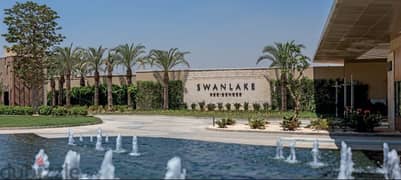 Own an apartment with a 5% down payment, delivery in 2026 in Swan Lake, Fifth Settlement, and a 25% cash discount_ Swan Lake in Hassan Allam
