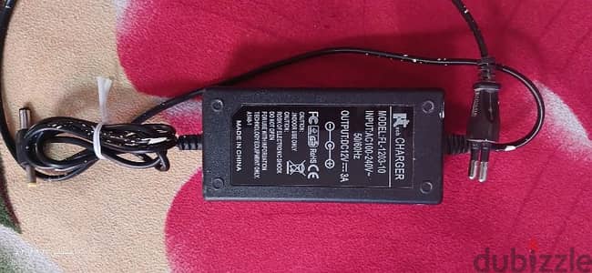 ادوبتر 12V شغاااال كويس جدااا مستعمل