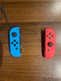 Nintendo Switch  V2 ( BARLEY USED ) with 3 Games with it 0