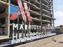 Only with a down payment of 880 thousand I own a hotel apartment ((with Marriott Hotel services)) finished with air conditioners & garage on Suez road 0