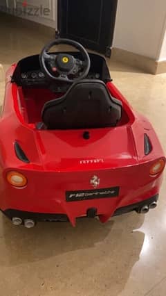 red toy ferrari