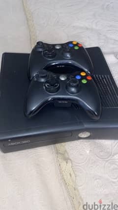 low usage xbox with 2 controllers,kinect and 100+ games