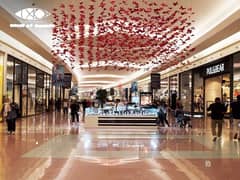 A store with a down payment of 400,000 EGP, facing the eastern axis, the Misr Mosque, the gold market and steps from Central Park, with payment over 9