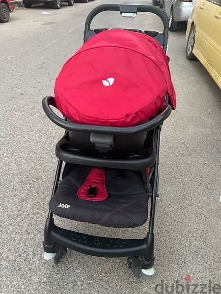 stroller with car seat from joie used like new 1