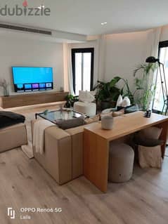 Luxury finished apartment by SODIC for sale in VYE Compound, Sheikh Zayed, near Beverly Hills 0