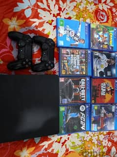 PS4 SLIM WITH 8 GAMES & 2 Justices