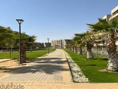 Own an apartment at a special price in Capital Gardens (palm hills) 0