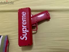 supreme money gun