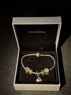 Pandora silver bracelet with charms 0