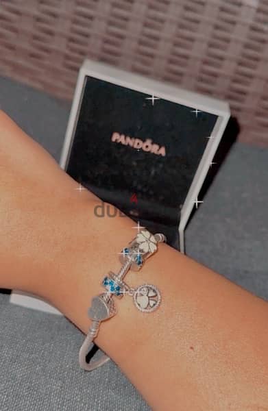 Pandora silver bracelet with charms 1