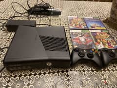 Xbox 360 (New) With 4 games and 2 controllers 0